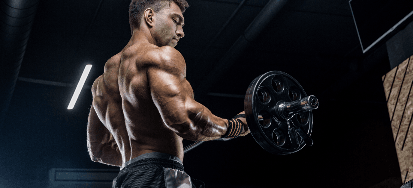 man lifting weights at the gym